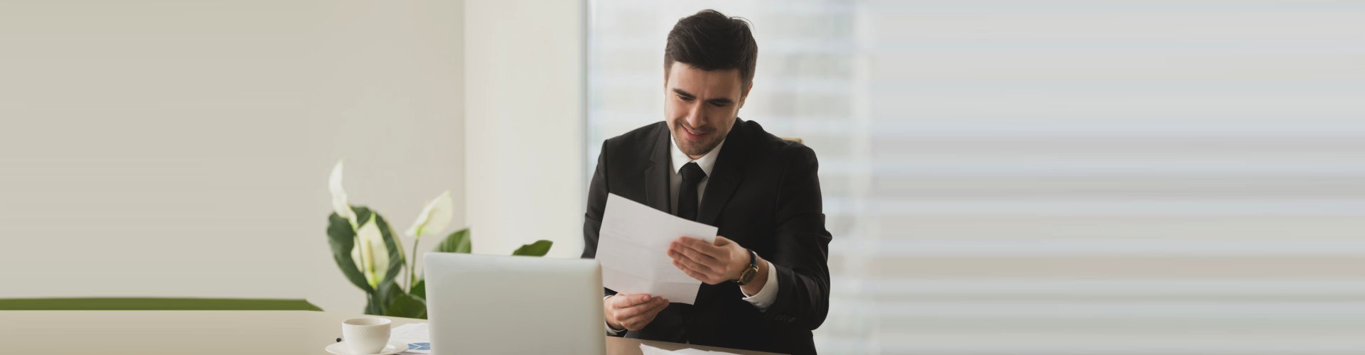 a man reading a paper